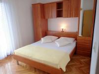 Postel nebo postele na pokoji v ubytování Apartments SIDRO on the beachfront