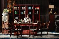 a woman sitting at a table in a room at Park Plaza Beijing Wangfujing in Beijing