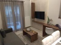 TV a/nebo společenská místnost v ubytování FLOW - White Tower Two Bedroom Suite