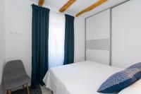 Posteľ alebo postele v izbe v ubytovaní Vacation house Pietra
