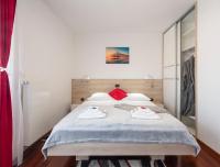 Postel nebo postele na pokoji v ubytování Ratkajec Luxury Apartments