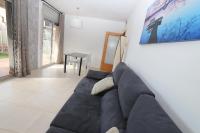 A seating area at DIFFERENTFLATS Paradise Village Families