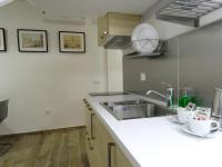 Kuchyňa alebo kuchynka v ubytovaní Living Sevilla Apartments Hércules