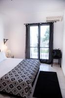 Posteľ alebo postele v izbe v ubytovaní Best located executive apartment in Maroussi.