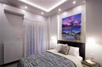 Postel nebo postele na pokoji v ubytování Metro Apartment