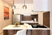 Kuchyň nebo kuchyňský kout v ubytování Metro Apartment