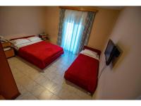 Postel nebo postele na pokoji v ubytování Apartment in Starigrad-Paklenica 6859