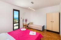 Postel nebo postele na pokoji v ubytování Two-Bedroom Apartment Crikvenica near Sea 12