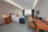 Postel nebo postele na pokoji v ubytování Tuzla Garden Hotel & Spa