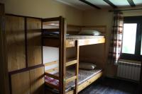 Palanda nebo palandy na pokoji v ubytování Hikers Hostel