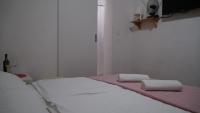 Posteľ alebo postele v izbe v ubytovaní Apartments Nera