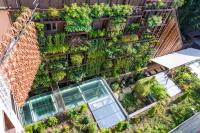 an overhead view of a building with a vertical garden at IOTA Hotel Tbilisi in Tbilisi City