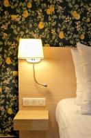 Hôtel de France, un hôtel AMMIにあるベッド