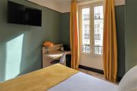 Hôtel de France, un hôtel AMMIにあるベッド