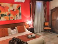 Łóżko lub łóżka w pokoju w obiekcie Hotel Borgo Antico