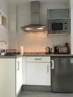Kuchyň nebo kuchyňský kout v ubytování Honeymoon Apartments