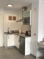 Kuchyň nebo kuchyňský kout v ubytování Honeymoon Apartments