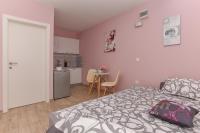 Posteľ alebo postele v izbe v ubytovaní Studio Apartment Deluxe
