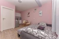 Posteľ alebo postele v izbe v ubytovaní Studio Apartment Deluxe