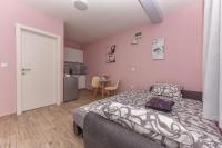 Posteľ alebo postele v izbe v ubytovaní Studio Apartment Deluxe