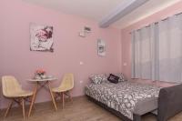 Posteľ alebo postele v izbe v ubytovaní Studio Apartment Deluxe