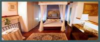 A bed or beds in a room at Appartamento a Palazzo Vinci