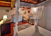A bed or beds in a room at Appartamento a Palazzo Vinci