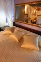 A bed or beds in a room at Appartamento a Palazzo Vinci