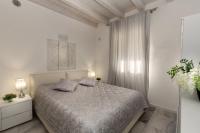 Posteľ alebo postele v izbe v ubytovaní Apartment Blue Laguna