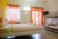 Posteľ alebo postele v izbe v ubytovaní Buonocore Rooms