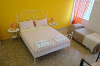 Posteľ alebo postele v izbe v ubytovaní Buonocore Rooms