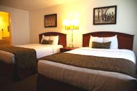 a hotel room with two beds and two lamps at Bryce View Lodge Part of the Ruby's Inn Resort in Bryce Canyon