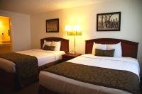a hotel room with two beds and two lamps at Bryce View Lodge Part of the Ruby's Inn Resort in Bryce Canyon