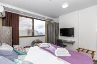 Posteľ alebo postele v izbe v ubytovaní Apinelo Tower Rooms