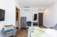 Posteľ alebo postele v izbe v ubytovaní Apinelo Tower Rooms