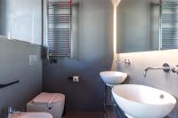 A bathroom at Pietra - The Italian Stay Collection