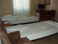 Posteľ alebo postele v izbe v ubytovaní Orfeas Hotel