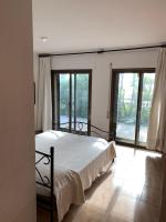 Posteľ alebo postele v izbe v ubytovaní APARTAMENTO - WIFI FREE - FRENTE AL MAR