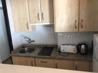 Kuchyňa alebo kuchynka v ubytovaní Apartamentos Mediterraneo