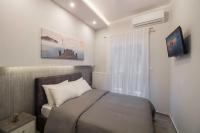 Postel nebo postele na pokoji v ubytování FLOW - White Tower Two Bedroom Suite