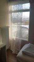 Postel nebo postele na pokoji v ubytování Hrafnabjörg 4