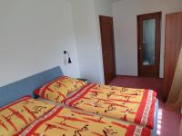 Postel nebo postele na pokoji v ubytování Vila Evička