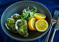 ein Teller mit Eiern, Gemüse und Orangen in der Unterkunft The Brudenell in Aldeburgh