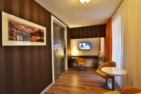 Televízia a/alebo spoločenská miestnosť v ubytovaní VIP Apartments