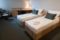Postel nebo postele na pokoji v ubytování Hotel D1