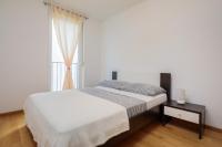 Posteľ alebo postele v izbe v ubytovaní ARIJANA APARTMAN free private garage