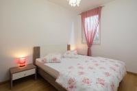 Posteľ alebo postele v izbe v ubytovaní ARIJANA APARTMAN free private garage