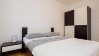 Posteľ alebo postele v izbe v ubytovaní ARIJANA APARTMAN free private garage