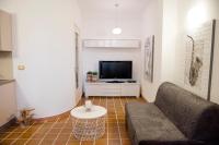 Televízia a/alebo spoločenská miestnosť v ubytovaní Casa Vela Bianca Mondello Addaura