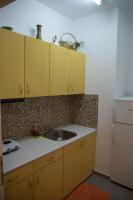 Kuchnia lub aneks kuchenny w obiekcie Mirto Apartments